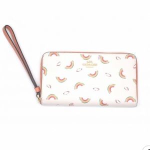 Coach large phone wallet with all over rainbow print used like new🌈☁️